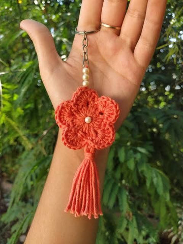 Crochet Orange Keychain in flower