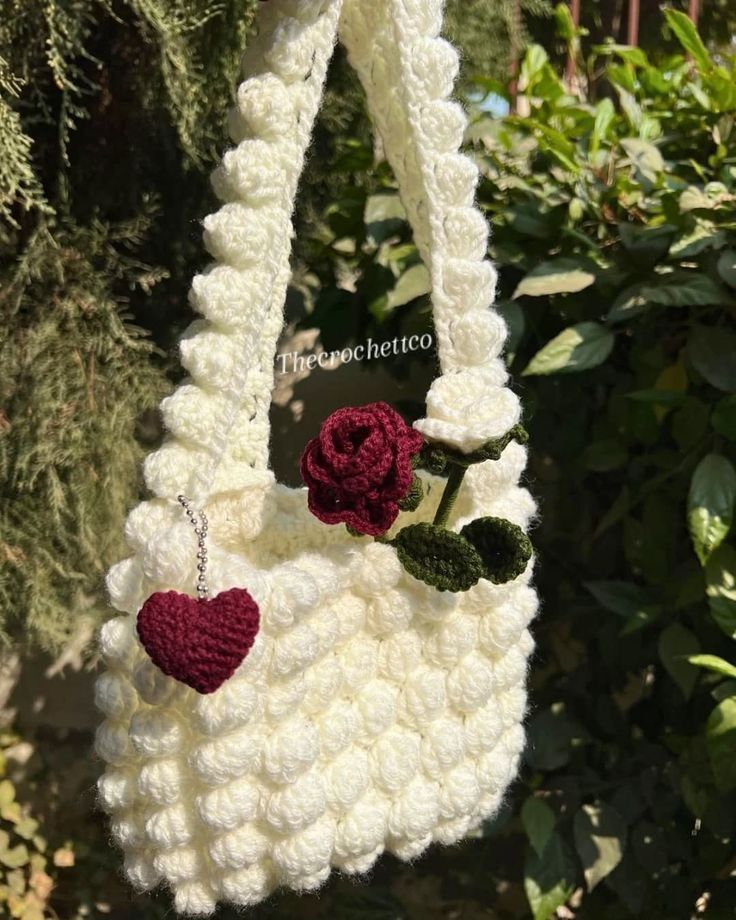 Crochet white bag with red flower and heart