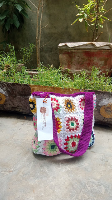 White bag with multi color touch