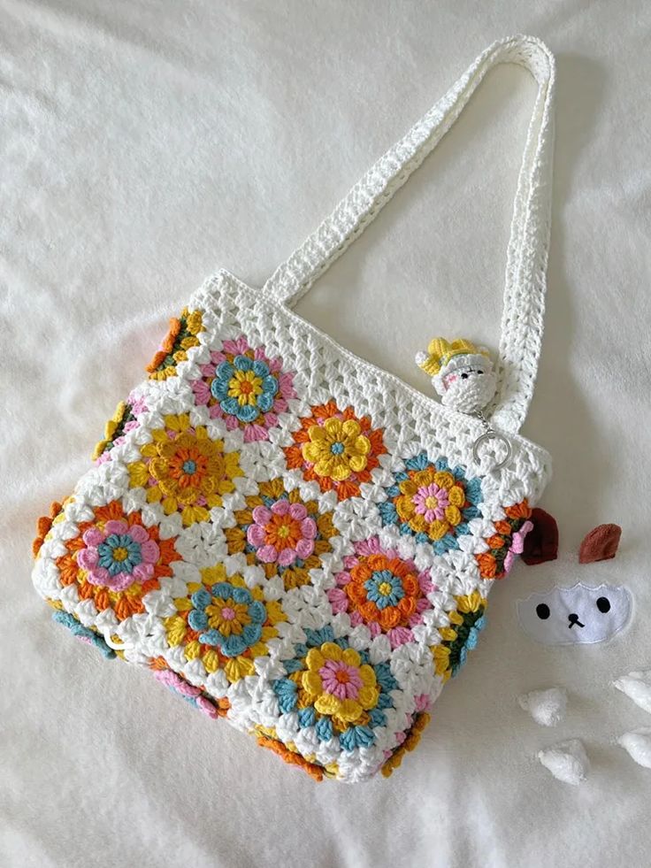 Crochet multi flower crochet bag with a keychains
