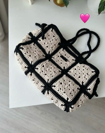 Skin and black crochet bag